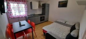 Kuchyň nebo kuchyňský kout v ubytování Palmarin