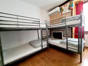 Postel nebo postele na pokoji v ubytování Arc House Madrid - Puerta del Sol Only Adults