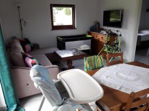 Posedenie v ubytovaní Apartament Fenowe Wzgórze
