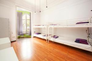 Posteľ alebo postele v izbe v ubytovaní Fabrizzios Terrace Hostel