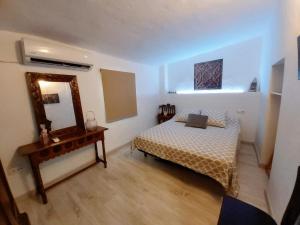 Postel nebo postele na pokoji v ubytování Alma Mudéjar Casa Rural
