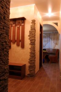 a room with a wall with a pile of fire bricks at Comfortable Apartments in Kryvyi Rih