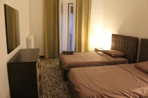 Postel nebo postele na pokoji v ubytování Apartment Little Bari