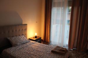 Postel nebo postele na pokoji v ubytování Apartment Little Bari