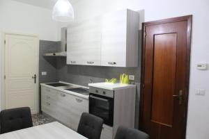 Kuchyň nebo kuchyňský kout v ubytování Apartment Little Bari