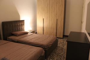 Postel nebo postele na pokoji v ubytování Apartment Little Bari