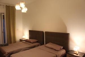 Postel nebo postele na pokoji v ubytování Apartment Little Bari