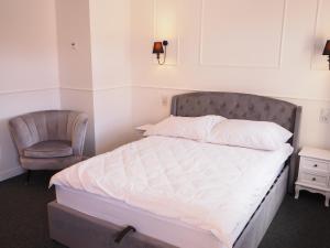 Łóżko lub łóżka w pokoju w obiekcie Apartamenty Stary Browar Oleśnica