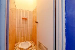 Koupelna v ubytování Pinky Guest House Syariah Kota Batu