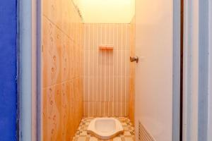 Koupelna v ubytování Pinky Guest House Syariah Kota Batu
