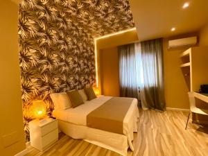 Posteľ alebo postele v izbe v ubytovaní Harmony House Prestige