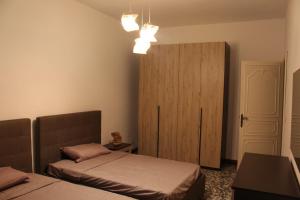 Кровать или кровати в номере Apartment Little Bari