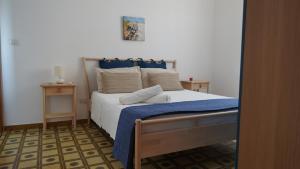 Posteľ alebo postele v izbe v ubytovaní B&B La Veranda