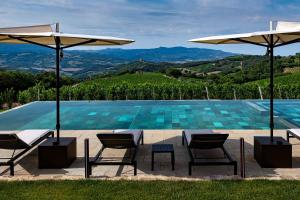 The swimming pool at or close to Mastrojanni Relais