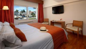 Postel nebo postele na pokoji v ubytování Hotel Tirol
