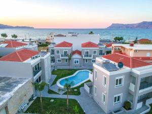 une image d'une villa avec vue sur l'océan dans l'établissement Limosa Luxury Residences, à Kíssamos
