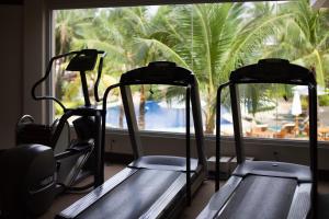 two treadmills in a gym next to a window at Henann Garden Resort in Boracay