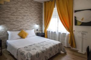 Postel nebo postele na pokoji v ubytování Aurelia Rooms