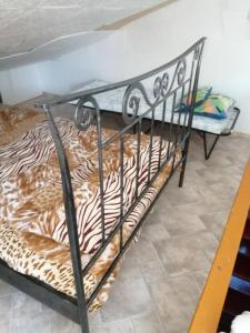 a metal bunk bed in a room at Apartment Filip in Vrbnik