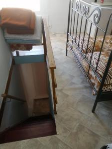 a stairway leading to a room with a bunk bed at Apartment Filip in Vrbnik