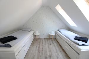 Posteľ alebo postele v izbe v ubytovaní Beach house