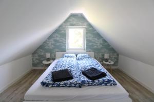 Posteľ alebo postele v izbe v ubytovaní Beach house