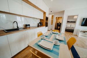 Kuchyň nebo kuchyňský kout v ubytování Marta Grottgera Apartments + 3 fotografie