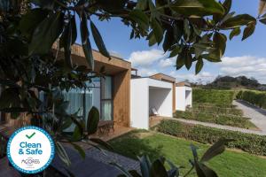 a view of a house with a sign that says clean and safe at Quinta de Santa Clara in Ponta Delgada