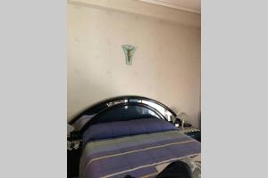 A bed or beds in a room at CAPO PELORO RELAX
