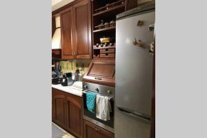 A kitchen or kitchenette at CAPO PELORO RELAX