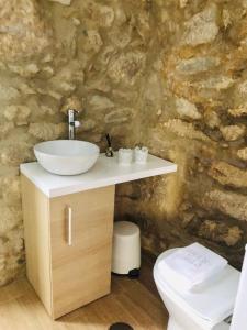 a bathroom with a sink and a toilet at Douro Pateo House in Vila Nova de Gaia +39 photos