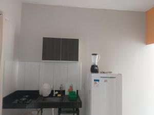 Kuchyň nebo kuchyňský kout v ubytování Casa Temporada Suítes