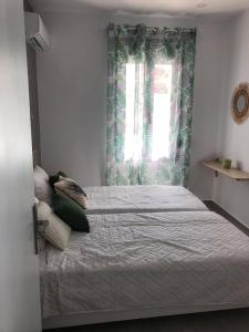 Postel nebo postele na pokoji v ubytování Calma apartment