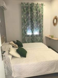 Postel nebo postele na pokoji v ubytování Calma apartment