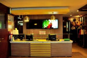 TV a/nebo společenská místnost v ubytování GV Tower Hotel