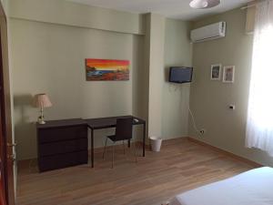 TV a/nebo společenská místnost v ubytování Villa Minù
