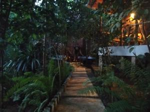 En hage utenfor Manthally Cabanas