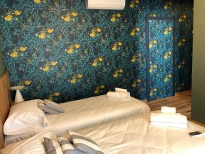 Postel nebo postele na pokoji v ubytování The Lion's Den BnB