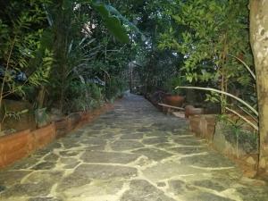 En hage utenfor Manthally Cabanas