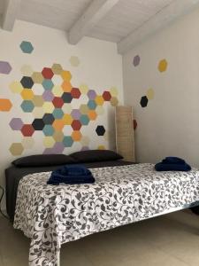 A bed or beds in a room at B&B Al Gravattone