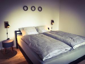 Ένα ή περισσότερα κρεβάτια σε δωμάτιο στο Vakantiewoning d'Hoppe