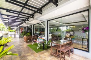 Balkón nebo terasa v ubytování Petchsiri Boutique Hotel เพชรสิริ บูทิค