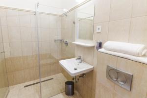 Kúpeľňa v ubytovaní Domus Peregrini Apartmanok