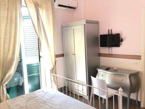 B&B Dimora Annulina客房内的一张或多张床位