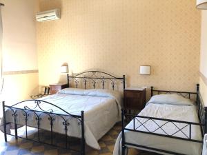 B&B Dimora Annulina客房内的一张或多张床位