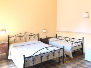 B&B Dimora Annulina客房内的一张或多张床位