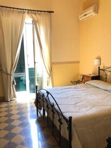 B&B Dimora Annulina客房内的一张或多张床位