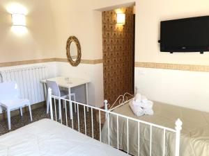 B&B Dimora Annulina客房内的一张或多张床位