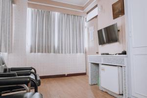 TV a/nebo společenská místnost v ubytování Tong Hsin Hotel