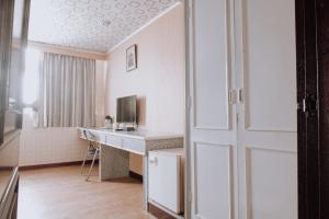 TV a/nebo společenská místnost v ubytování Tong Hsin Hotel